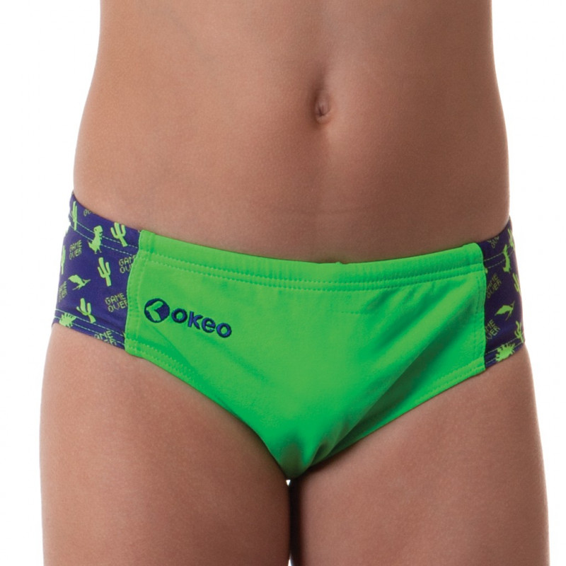 Costume slip per il nuoto da bambino verde fluo con inserti laterali. 100% foderato. Costume slip per il nuoto da bambino verde fluo con inserti laterali. 100% foderato.