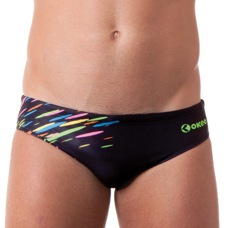 Costume slip uomo per il nuoto con base nera e un disegno fluo sul fianco. Resistente al cloro. Costume slip uomo per il nuoto con base nera e un disegno fluo sul fianco. Resistente al cloro.