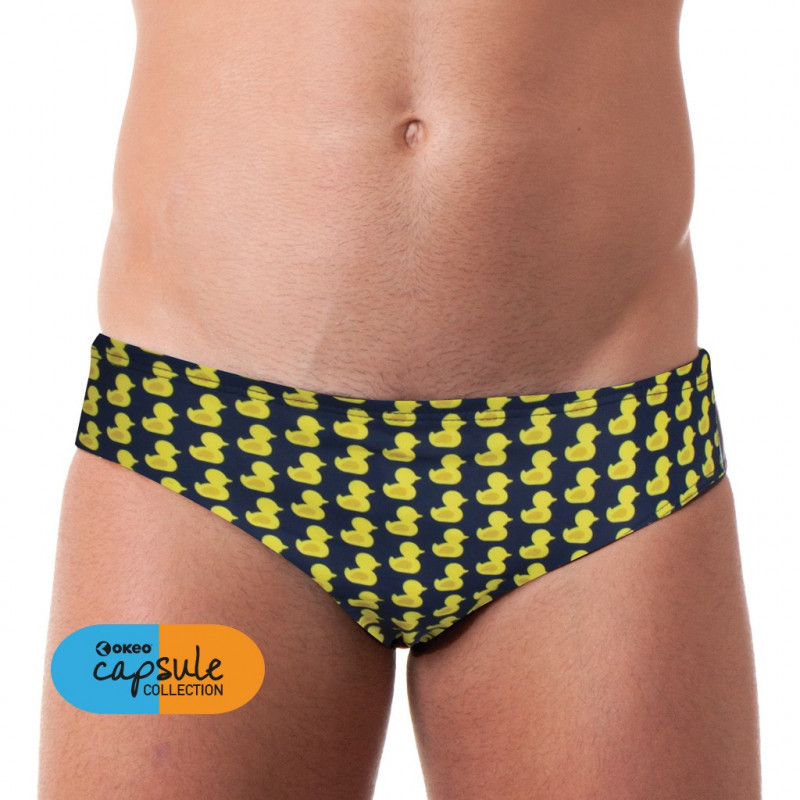 Costume slip da uomo per il nuoto e il mare con fondo blu e simpatica texture paperelle gialle. Dell Costume slip da uomo per il nuoto e il mare con fondo blu e simpatica texture paperelle gialle. Dell