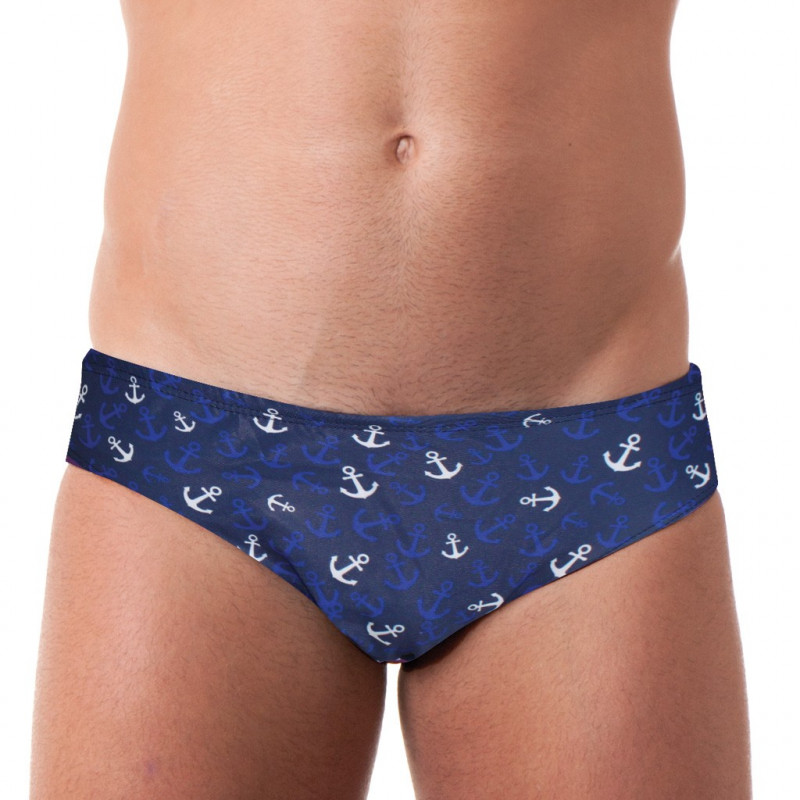 Costume slip da uomo per la piscina e il mare, con piccole ancore tono su tono. Costume slip da uomo per la piscina e il mare, con piccole ancore tono su tono.