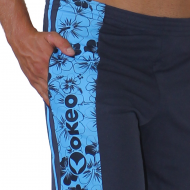 Bermuda unisex con tasche e banda laterale stampata.